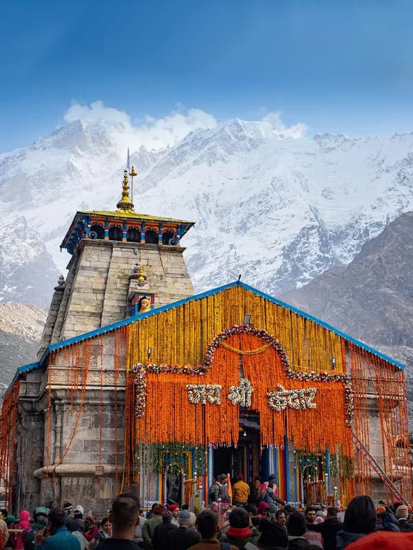Kedarnath Temple with snow-covered Himalayan peaks in the background